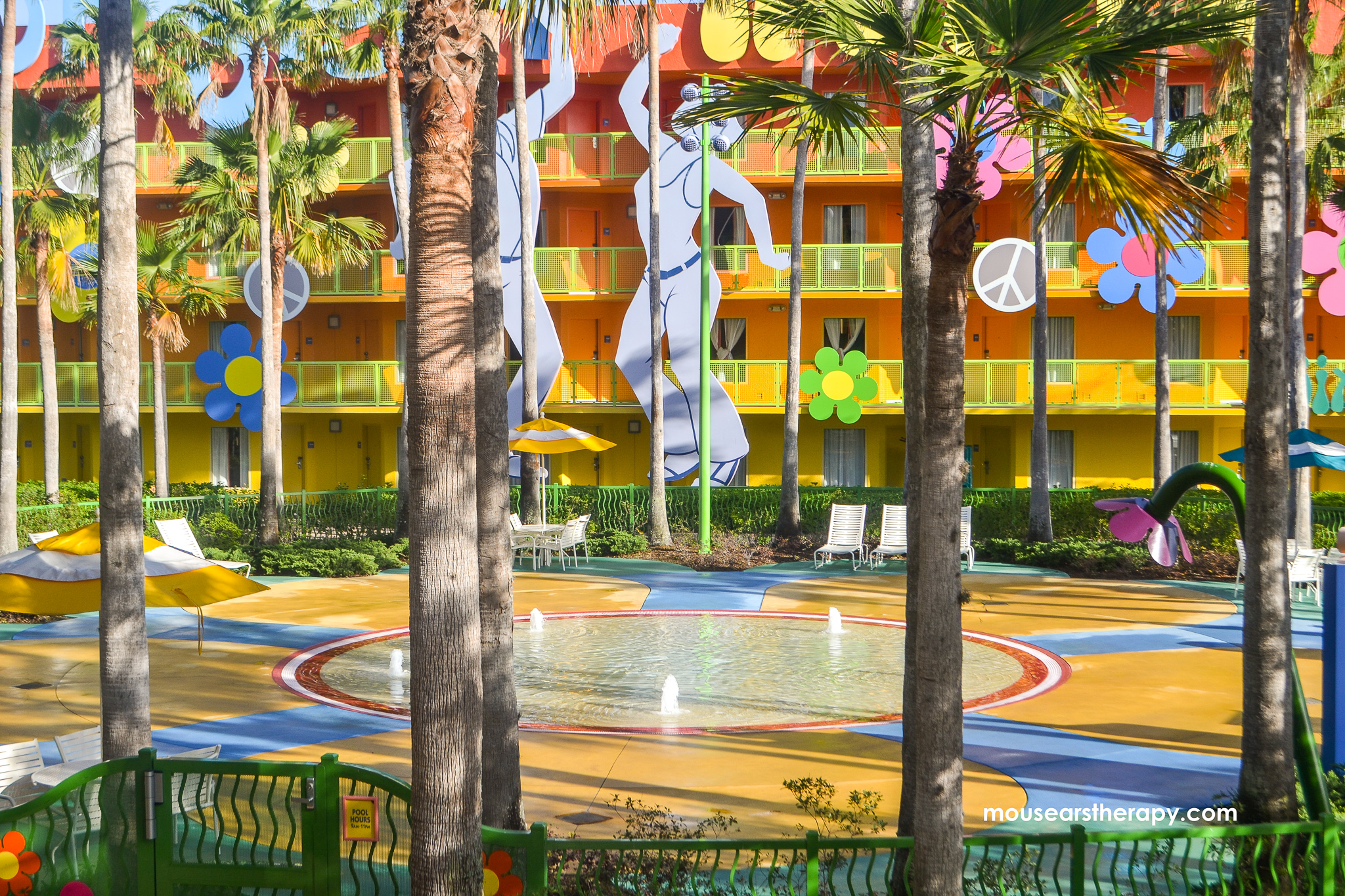 View of splash pad for younger kids, behind Hippy Dippy pool at Pop Century resort. 