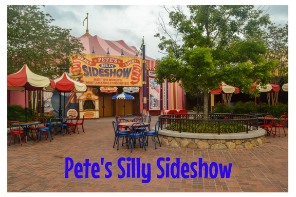 The table area in front of Pete's Silly Sideshow is a great sensory break area in Disney's Magic Kingdom.